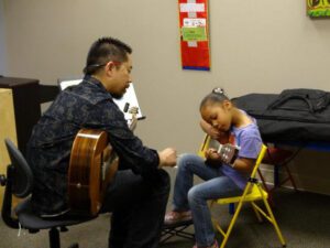 Guitar Lessons at Musical Surprise